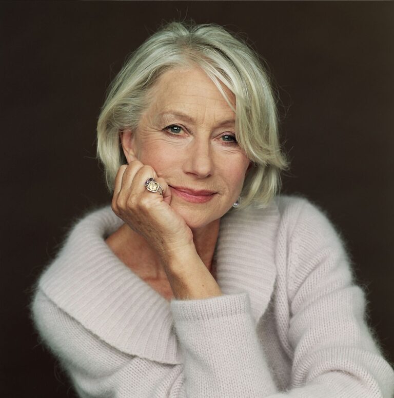 Helen Mirren wearing a glamorous outfit, symbolizing her legendary acting career and versatility