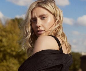 Ella Henderson British pop singer performing live on stage