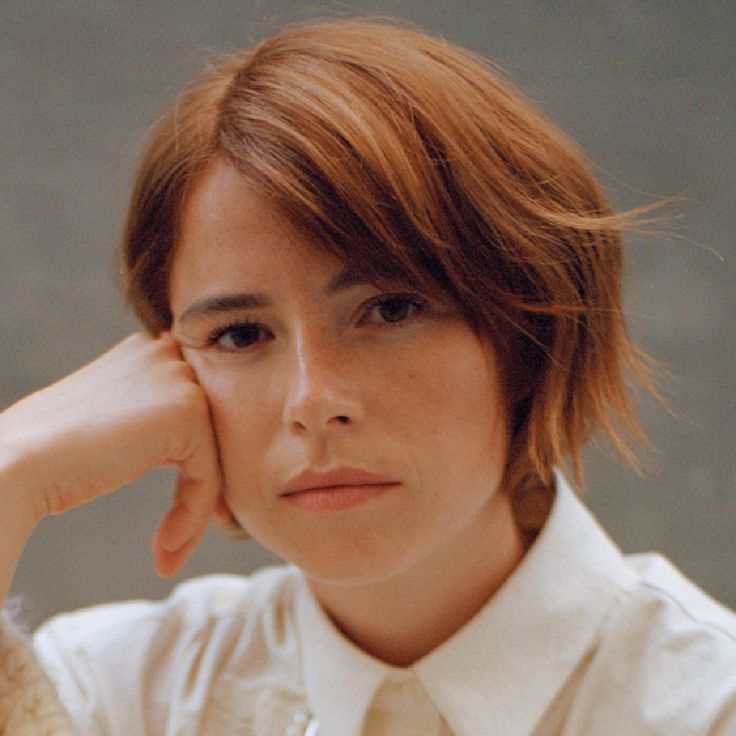 Jessie Buckley attending a red carpet event in a stunning gown, representing her Hollywood and theatre success