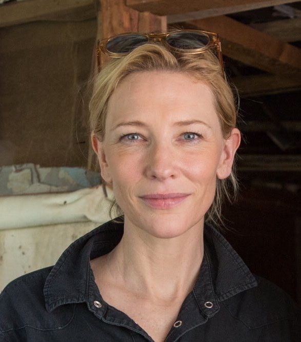 Cate Blanchett posing at a red carpet event, showcasing her iconic style and acting presence