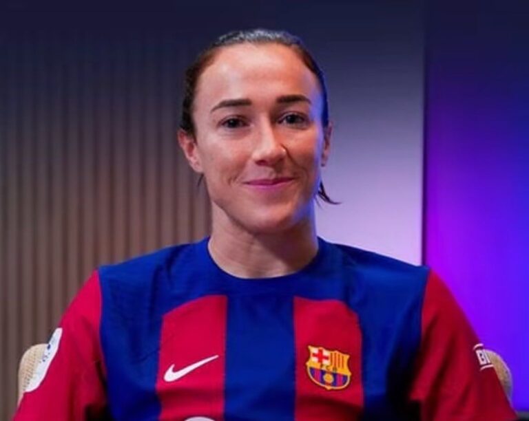 Lucy Bronze celebrating after winning the UEFA Women’s Champions League trophy