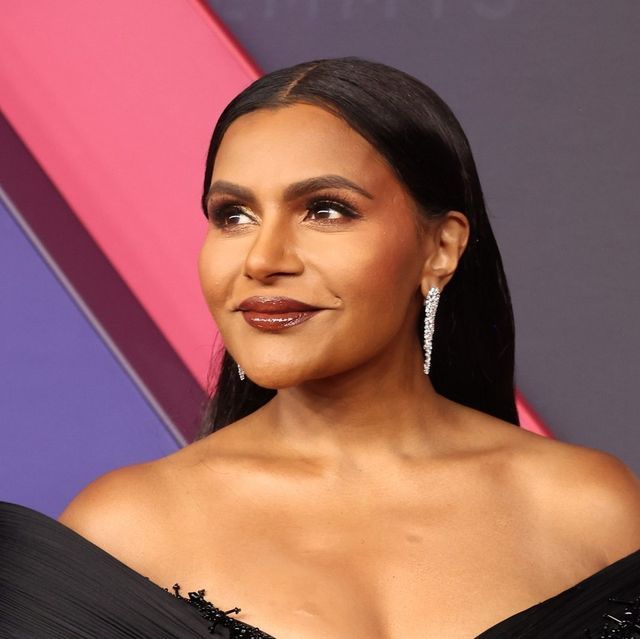 10 Inspiring Ways Mindy Kaling Revolutionized Comedy and Hollywood Mindy Kaling smiling at a red carpet event, showcasing her vibrant personality and confident style.