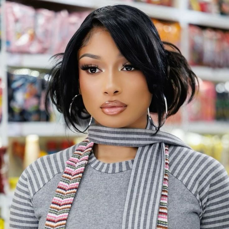 10 Powerful Reasons Why Megan Thee Stallion is the Ultimate Music Icon Megan Thee Stallion performing on stage, embodying confidence, empowerment, and musical talent