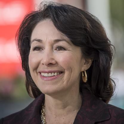 “Safra Catz, former CEO of Oracle, speaking at a conference on cloud computing and AI innovation.”