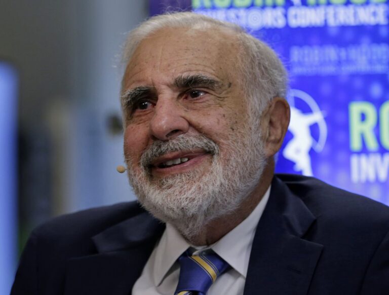 “Carl Icahn, billionaire corporate raider and activist investor, reviewing investments at his Miami office”
