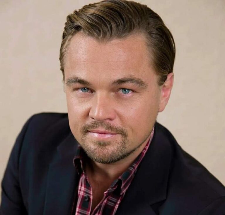“Leonardo DiCaprio posing on a red carpet in a black tuxedo, smiling and holding an Oscar award, symbolizing his Hollywood success and environmental activism.”