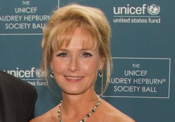 Randa Duncan Williams, non-executive chairman of Enterprise Products Partners, overseeing Texas energy operations with pipelines in the background.
