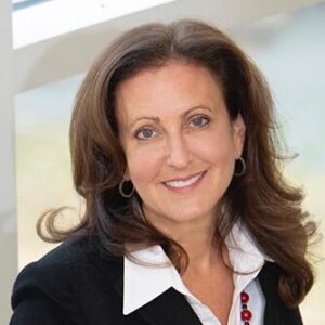 Lauri Union, family business leader, speaking at an entrepreneurship conference at Babson College, representing leadership and business success