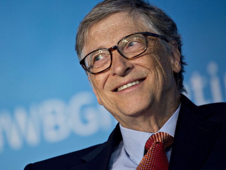 “Bill Gates, Microsoft co-founder and global philanthropist speaking at a technology conference.”